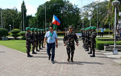 <p><strong>GUV, STILL.</strong> <em>Negros Oriental Governor Roel Degamo troops the line during the recent arrival of the 15th  Infantry Battalion of the Philippine Army in the province. (Photo by Juancho Gallarde) </em></p>